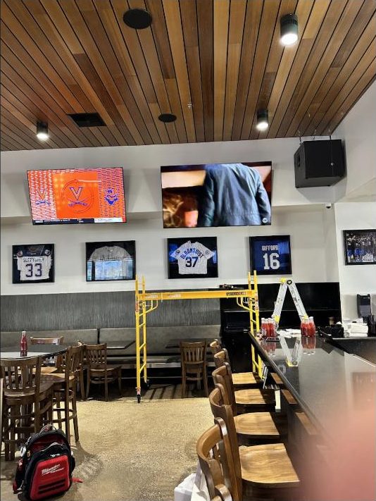 Multiple TVs fed from one video distribution system, installed by Kalieb Designs